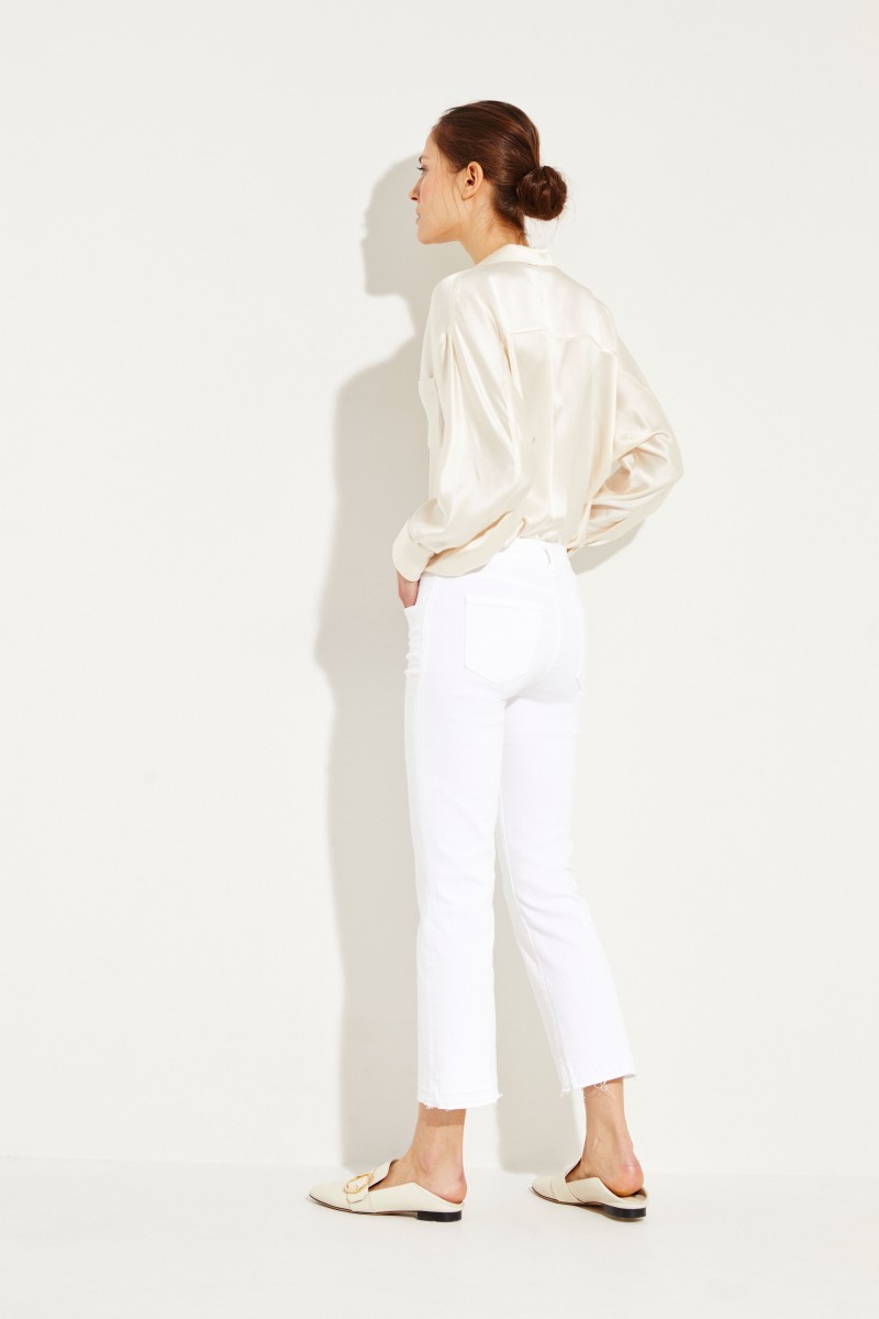 Jeans mit ausgestellten Säumen Weiß