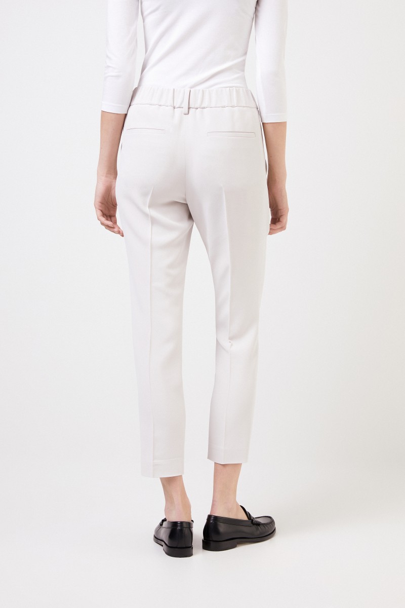 Brunello Cucinelli Seiden-Bundfaltenhose Crème