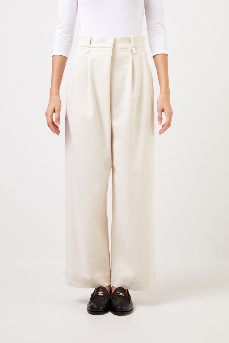 Brunello Cucinelli Baumwoll-Bundfaltenhose Beige