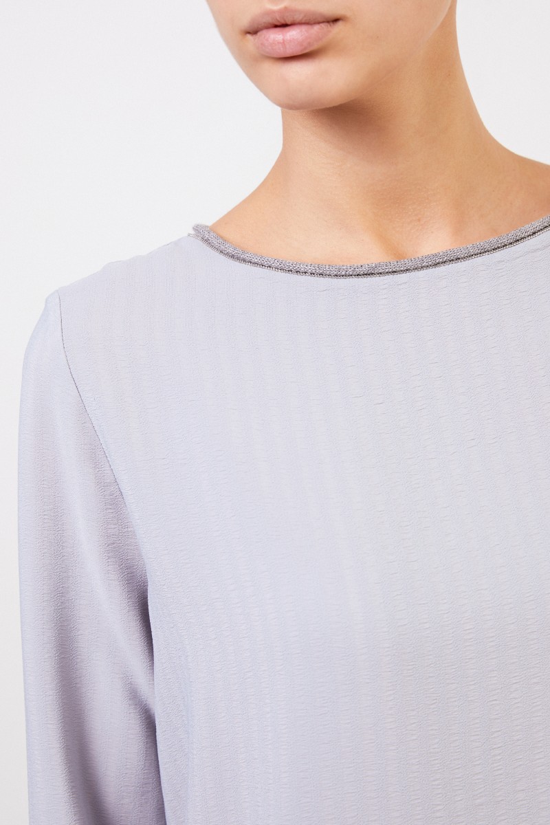 Bluse mit Perlenverzierung Hellblau